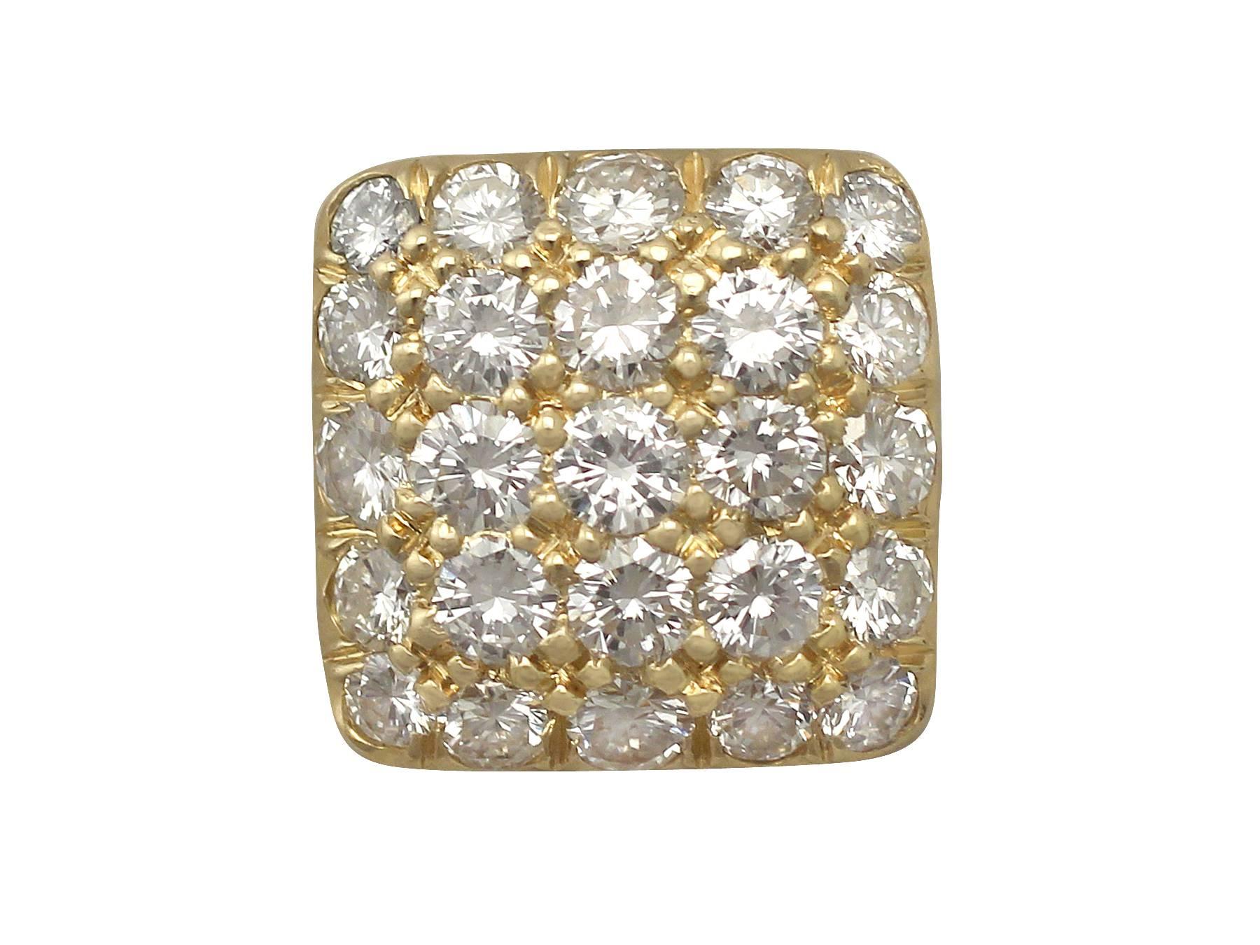 A fine and impressive pair of 1.50 carat diamond and 18 karat yellow gold cufflinks; part of our diverse antique jewelry and estate jewelry collections 

This fine and impressive pair of diamond cufflinks has been crafted in 18k yellow