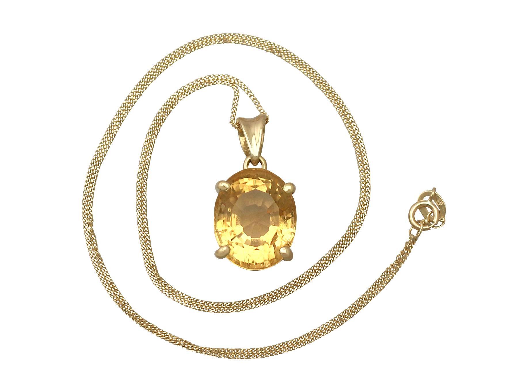 A fine and impressive 9.87 carat citrine and 18 carat yellow gold pendant; part of our diverse vintage jewellery and estate jewelry collections

This fine and impressive citrine pendant has been crafted in 18k yellow gold.

The pierced decorated