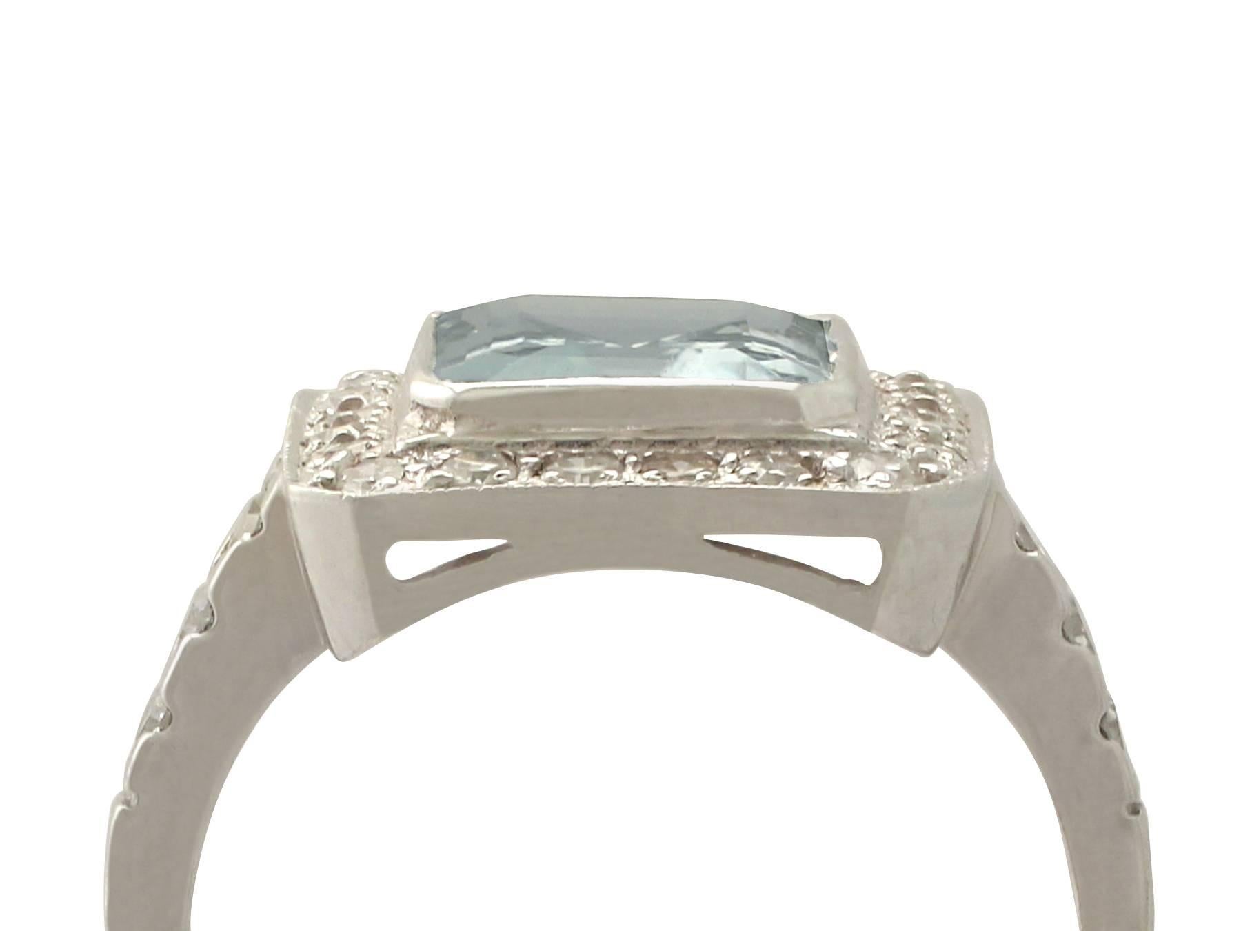 An impressive 2.50 carat aquamarine and 0.52 carat diamond, 18 karat white gold cluster style dress ring; part of our diverse gemstone jewelry collections

This fine and impressive aquamarine and diamond ring has been crafted in 18 k white