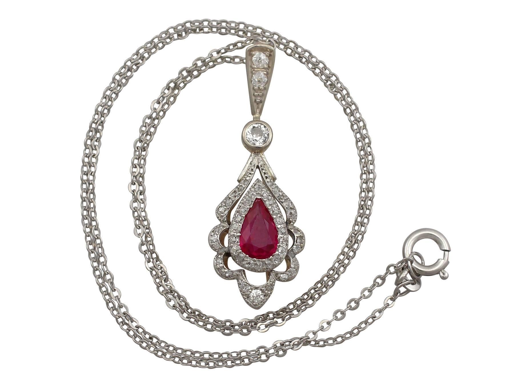 An impressive 0.75 carat pinkish red ruby and 0.37 carat diamond, 18 karat yellow gold and platinum set pendant; part of our diverse antique collections

This fine and impressive diamond and ruby pendant has been crafted in 18 k yellow gold with a