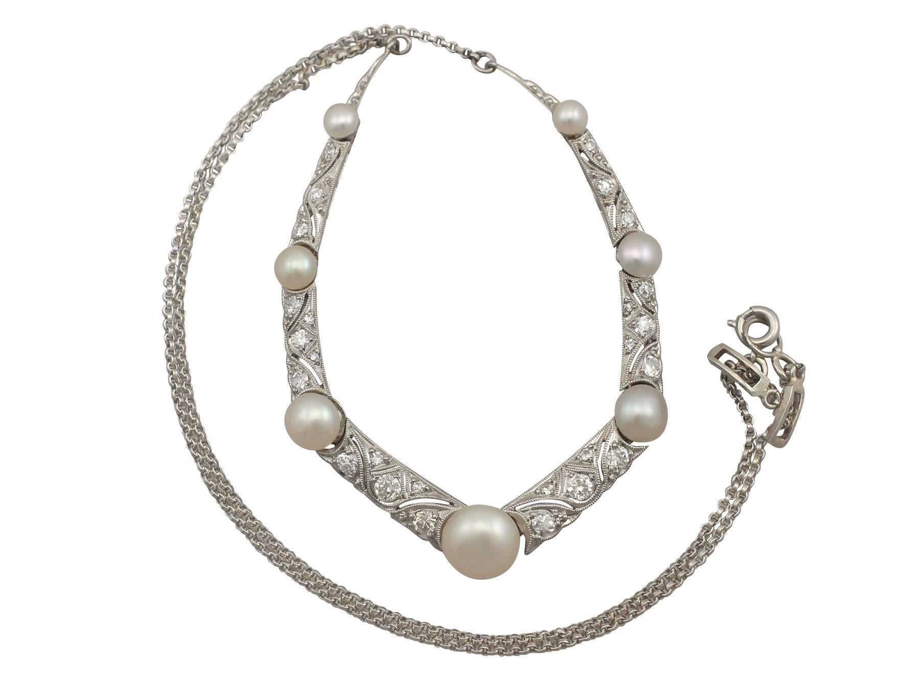 A stunning antique 0.97 carat diamond, pearl and platinum collarette style necklace; part of our diverse antique jewelry and estate jewelry collections

This stunning, fine and impressive antique collarette necklace has been crafted in