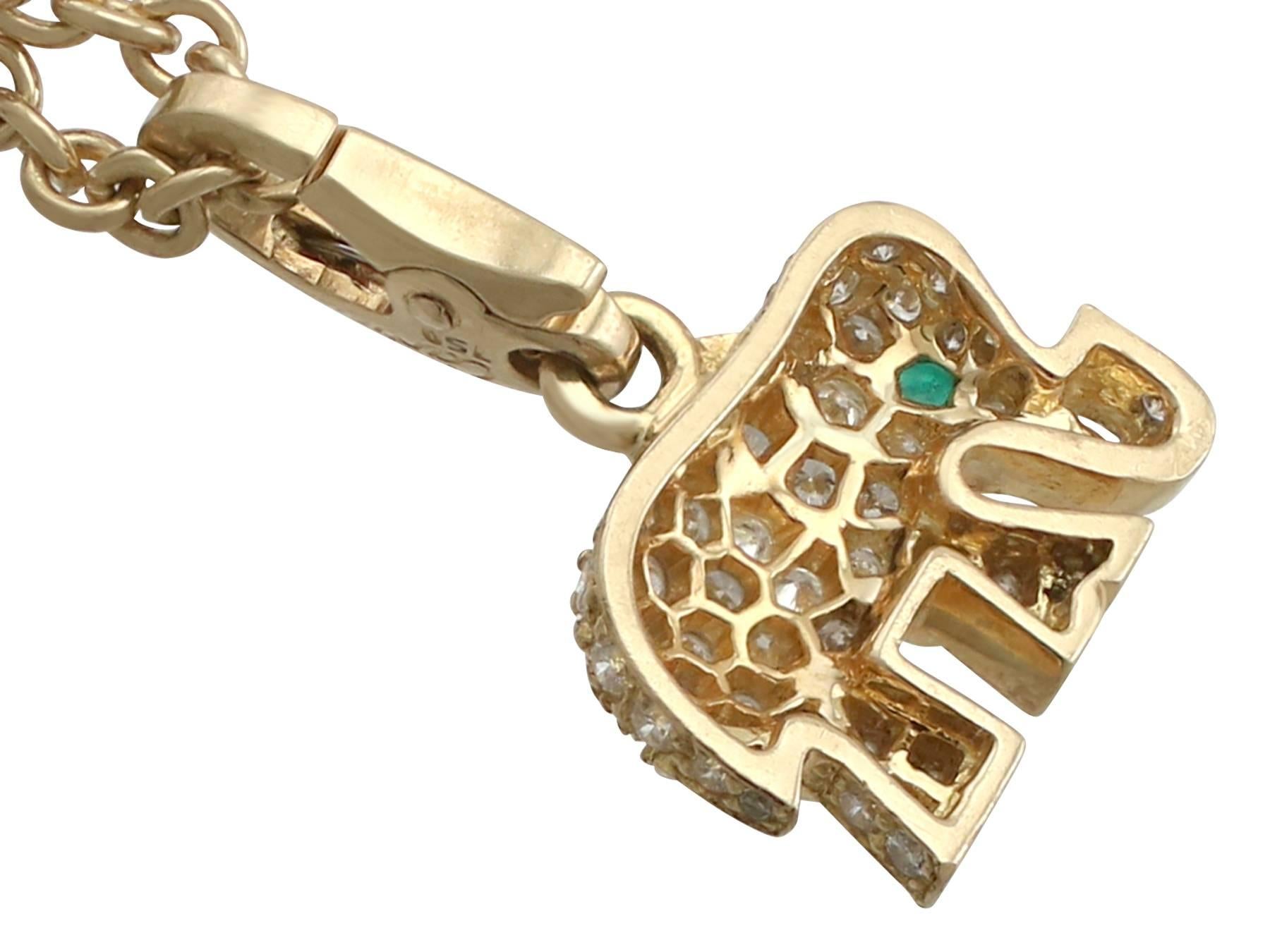 gold elephant pendant with diamonds