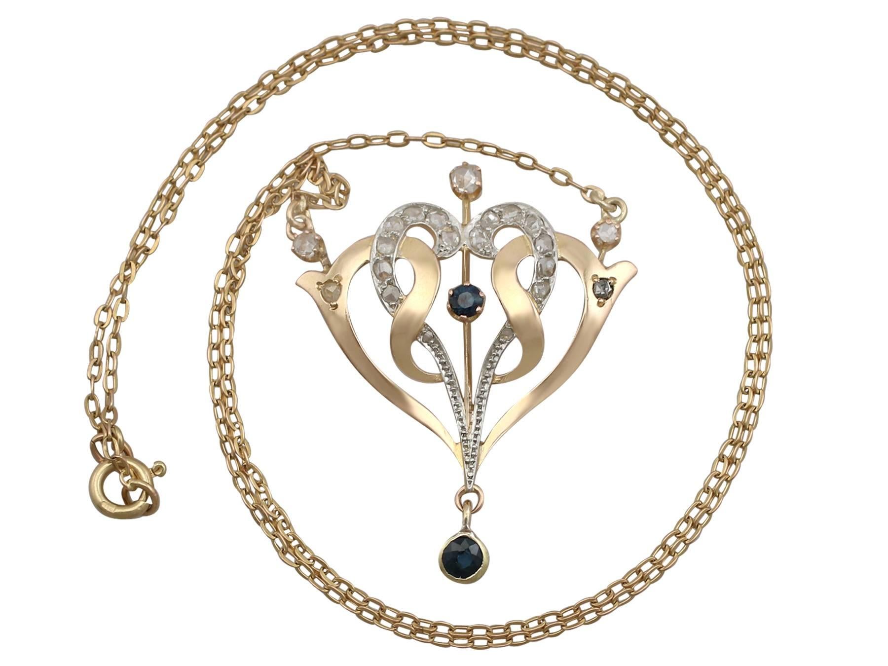 A fine 0.30 carat blue sapphire and 0.52 carat diamond, 18 karat yellow and white gold necklace; part of our diverse Art Nouveau jewelry collections

This fine and impressive antique Art Nouveau necklace has been crafted in 18k yellow gold with an