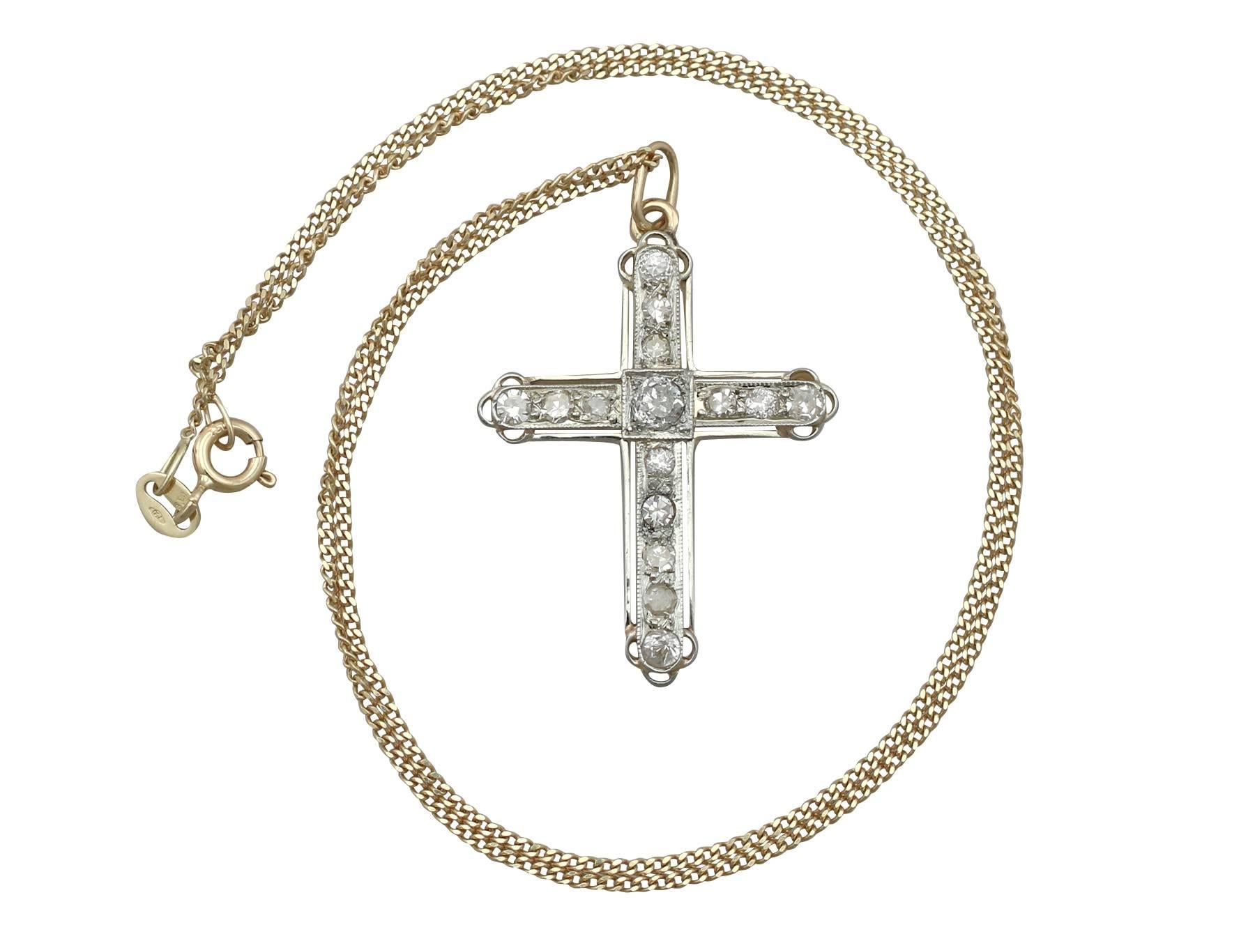 This impressive 0.91 carat diamond and 18 karat yellow gold, 18 karat white gold set 'cross' pendant; part of our diverse vintage jewelry and estate jewelry collections

This fine and impressive vintage diamond cross pendant has been crafted in 18 k