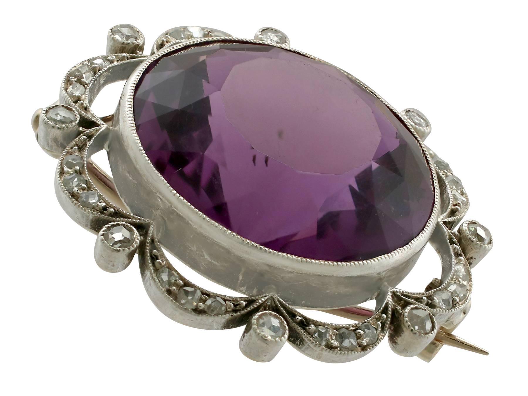 A stunning 24.46 carat amethyst and 0.33 carat diamond, 9 karat yellow gold and silver set brooch; part of our diverse antique jewelry and estate jewelry collections.

This stunning, fine and impressive Victorian amethyst brooch has been crafted in