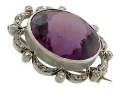 Broche ancienne en or jaune et argent avec améthyste de 26,46 carats et diamants