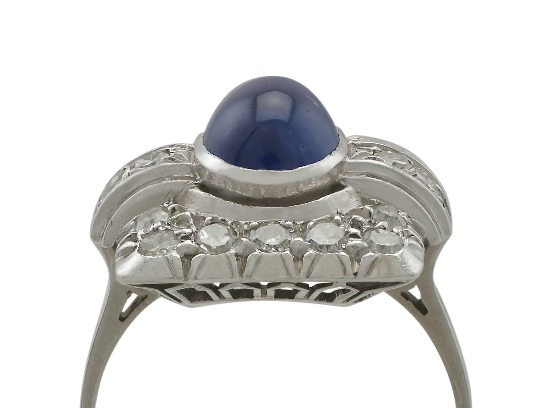 A fine antique Art Deco 1.85 carat blue sapphire and 0.36 carat diamond, platinum cluster ring; part of our diverse antique jewellery collections.

This fine and impressive sapphire cocktail ring has been crafted in platinum.

The pierced decorated