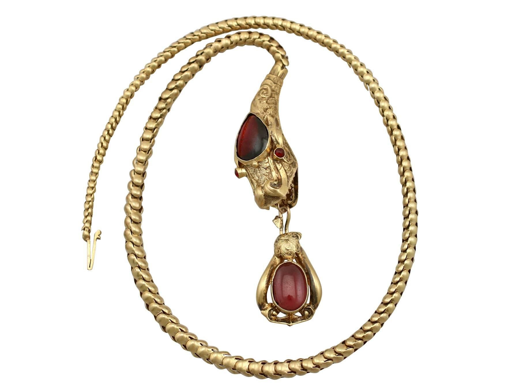 A stunning antique Victorian 3.92 carat garnet and 20 karat yellow gold necklace in the form of a dragon; part of our diverse antique jewelry and estate jewelry collections


This stunning fine and impressive dragon necklace has been crafted in 20 k