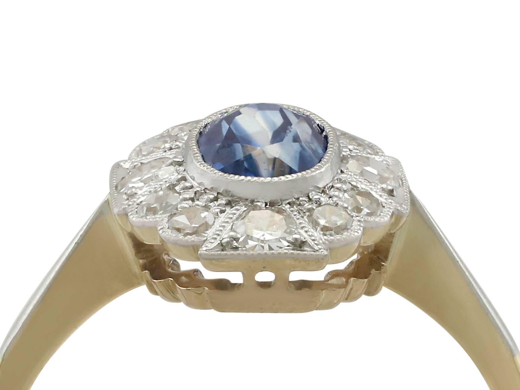 A fine and impressive 0.43 carat sapphire and 0.25 carat diamond, 18 karat yellow gold and platinum set cocktail ring; part of our diverse antique jewelry and estate jewelry collections

This fine and impressive oval sapphire and diamond ring has