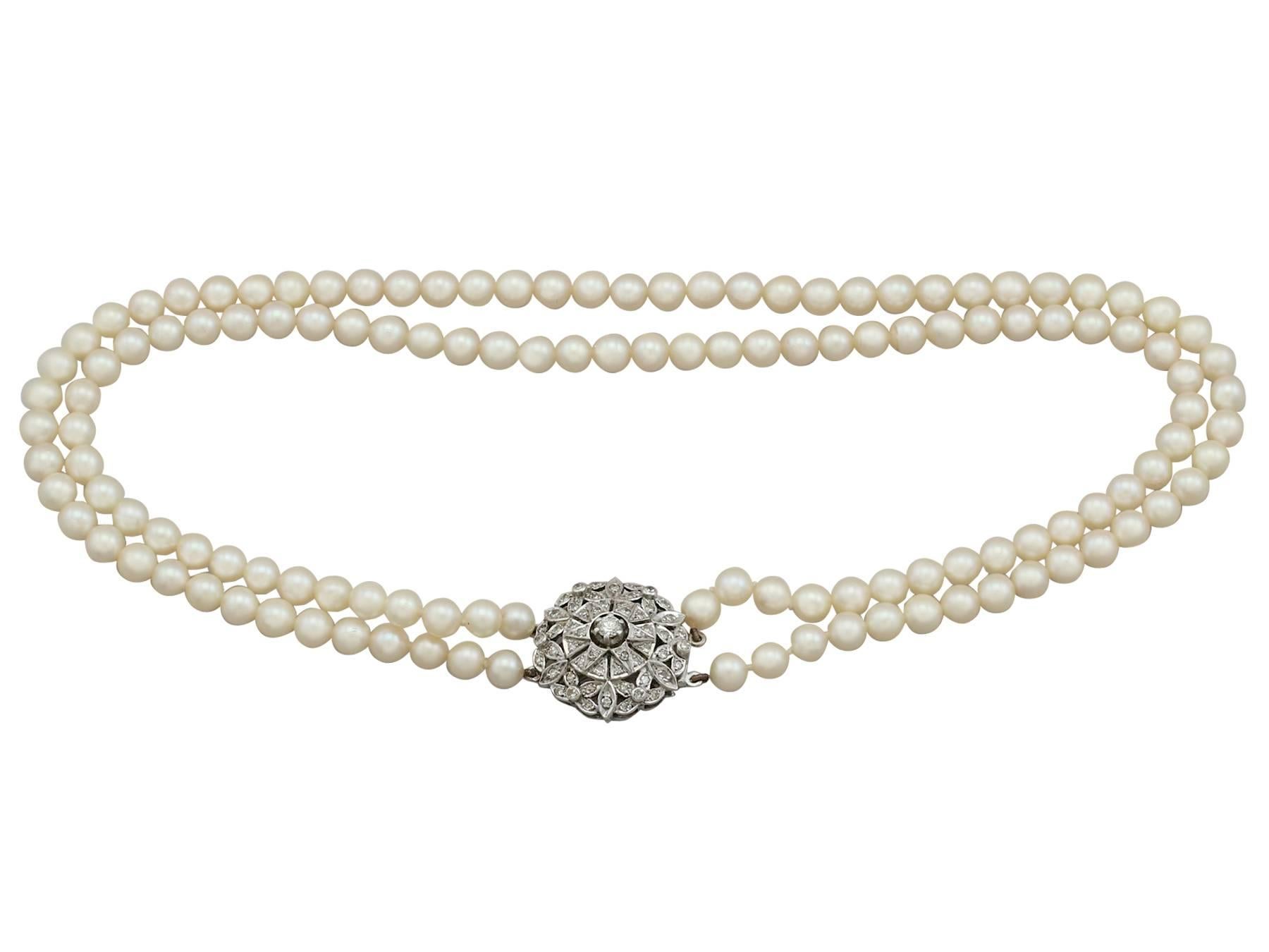 1970s Double Strand Pearl Necklace with 1.05 Carat Diamond White Gold Clasp 1