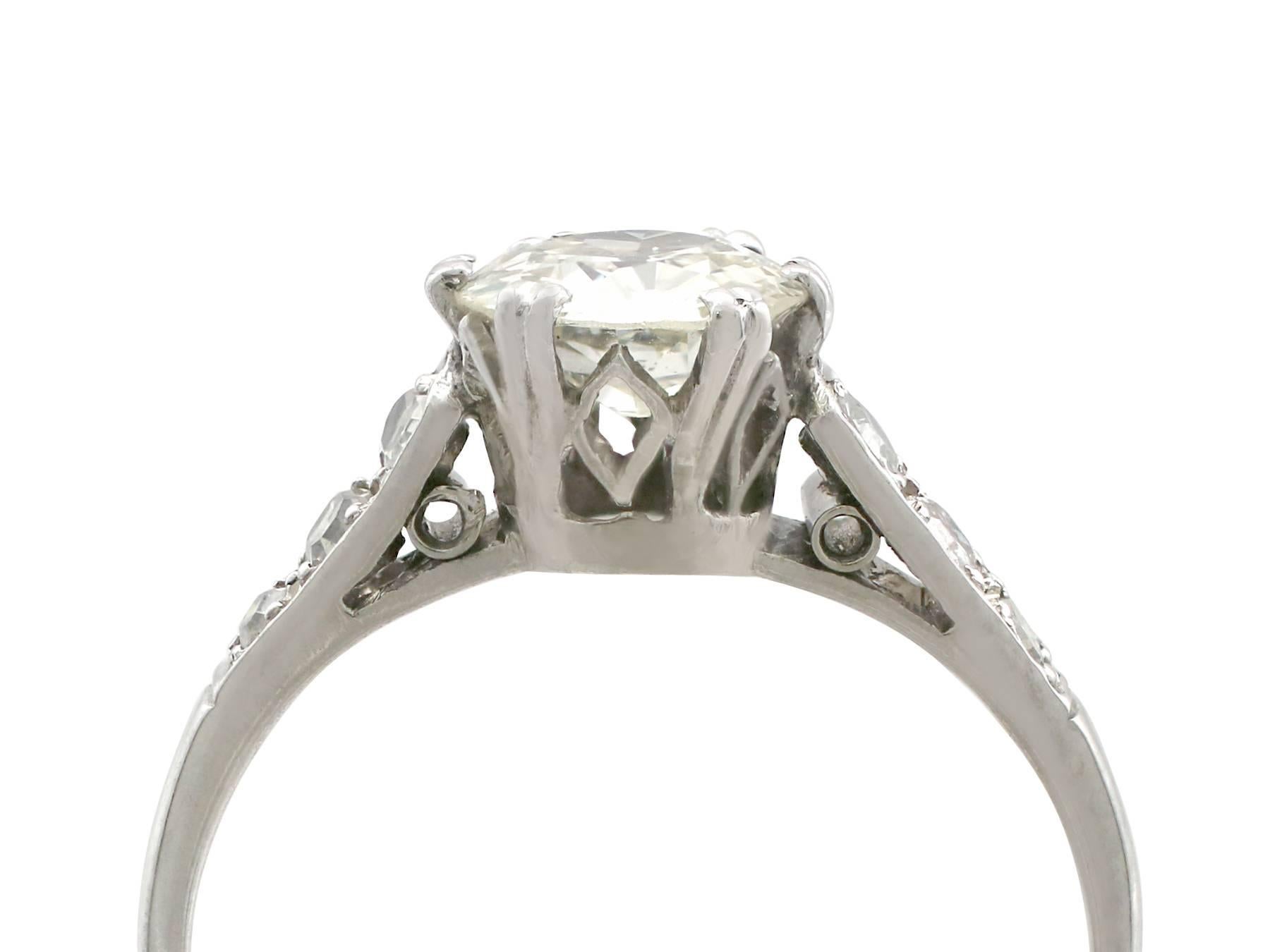 An impressive 1.02 carat diamond and platinum solitaire ring with 0.12 carat diamond accents; part of our diverse antique jewelry and estate jewelry collections

This fine and impressive 1930's diamond engagement ring has been crafted in