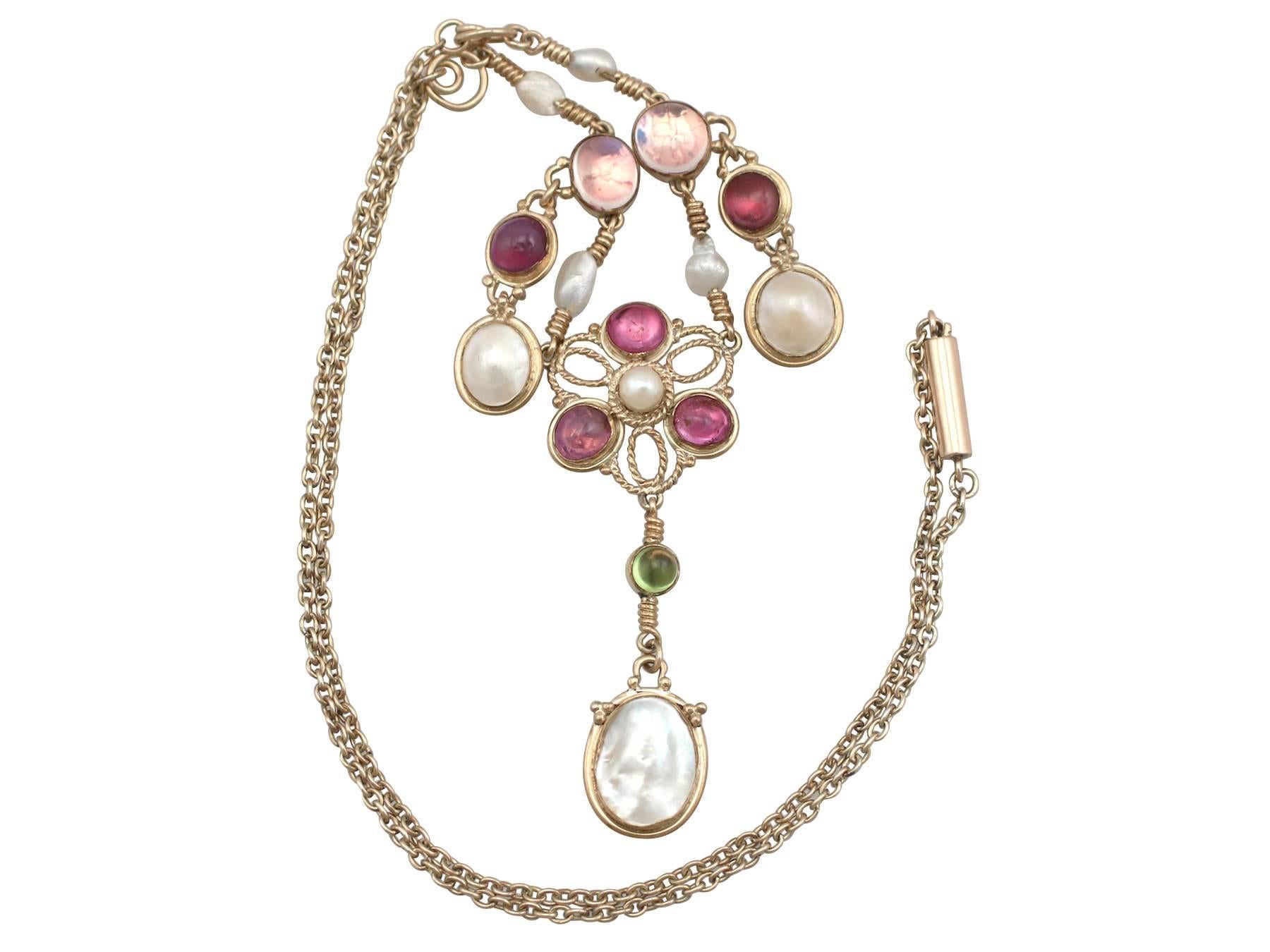 An exceptional antique pearl and 3.32 carat amethyst, peridot and moonstone, 9 karat yellow gold necklace; part of our diverse antique jewelry collections

This stunning, fine and impressive pearl and gemstone necklace has been crafted in 9 k yellow