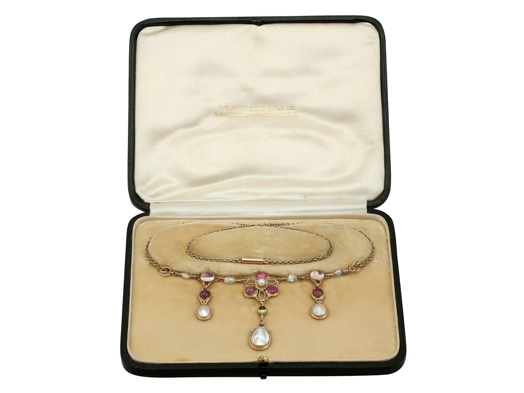 1920s Pearl and 3.32 Carat Moonstone Peridot and Amethyst Yellow Gold Necklace 3