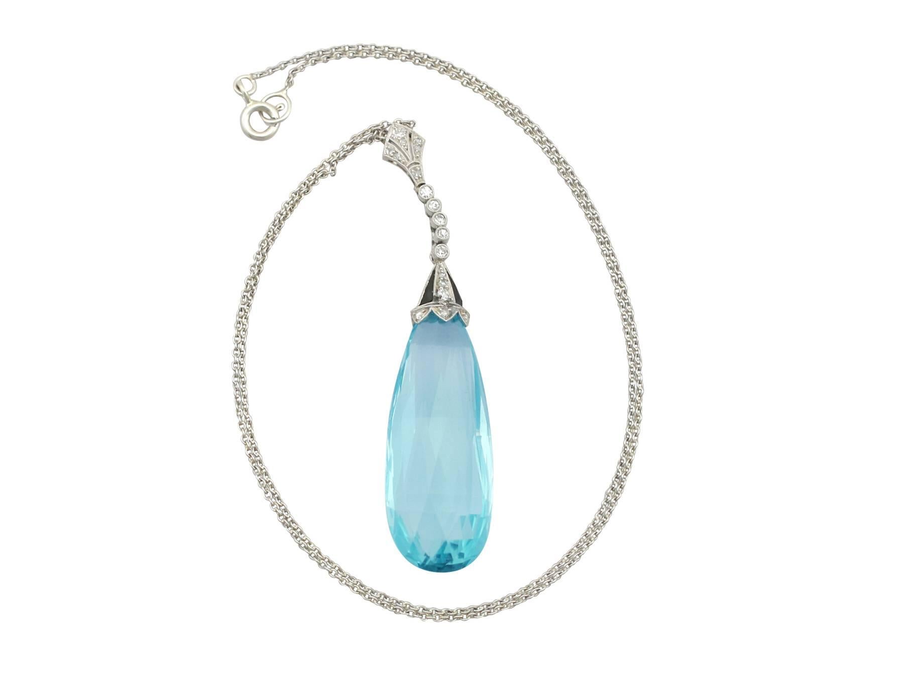 A stunning Art Deco 23.64 carat aquamarine and 0.26 carat diamond, platinum drop style necklace; part of our diverse antique jewelry and estate jewelry collections

This stunning, fine and impressive large aquamarine pendant has been crafted in