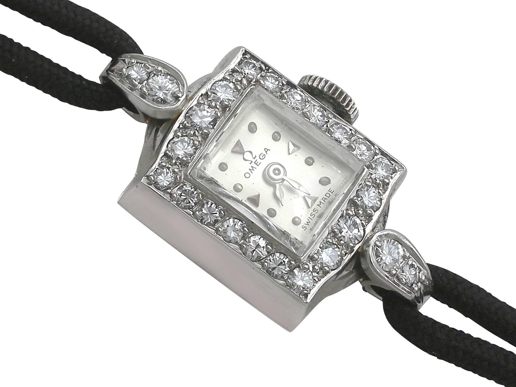 An impressive vintage 0.78 carat diamond and platinum cocktail watch by Omega; part of our diverse ladies diamond watch collections

This fine and impressive vintage Omega diamond watch has been crafted in platinum.

The watch has a rectangular dial