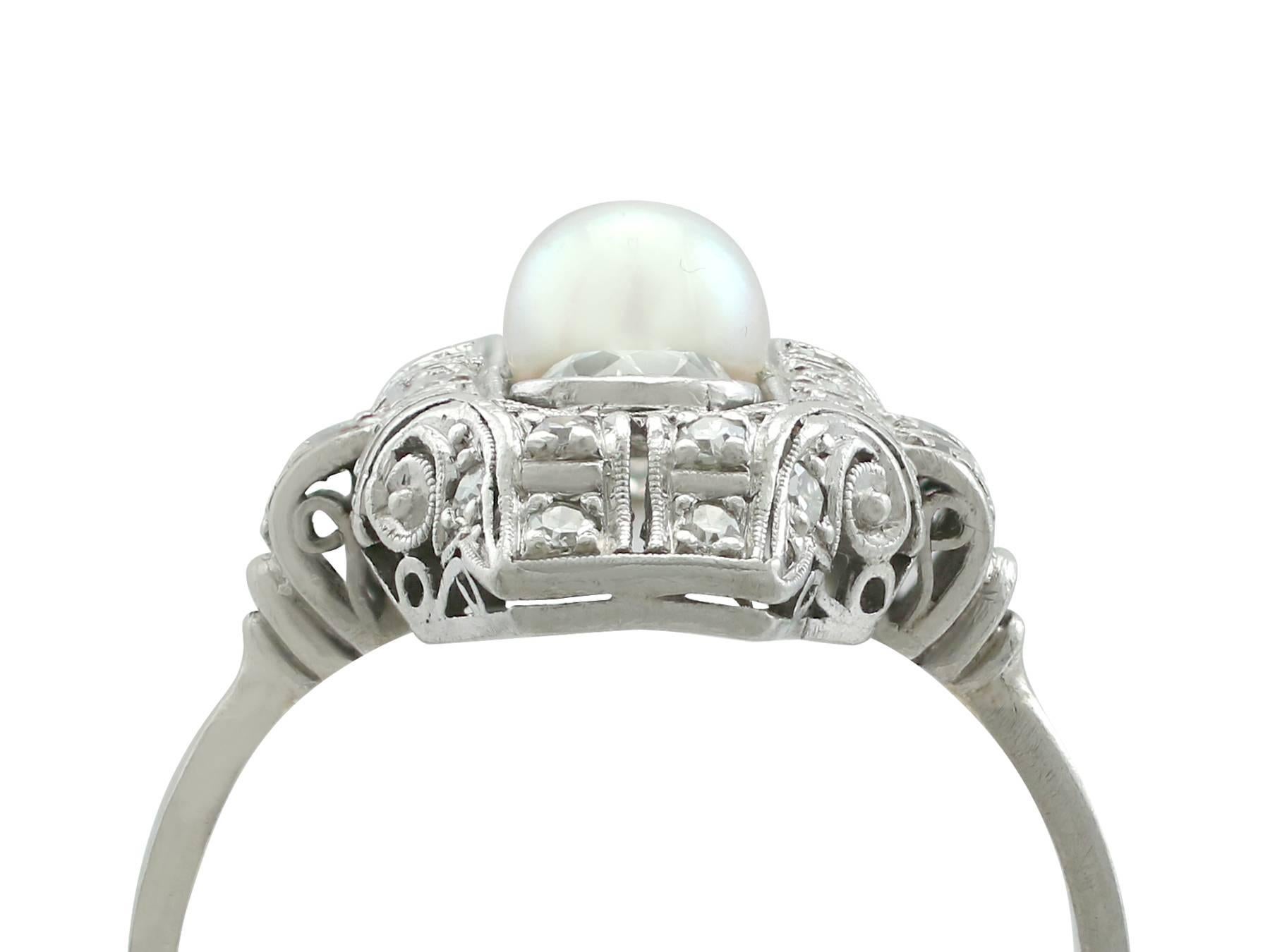 A stunning, fine and impressive vintage Art Deco 1.12 carat diamond, pearl and platinum cocktail ring; part of our diverse pearl jewelry collections

This stunning, fine and impressive pearl and diamond ring has been crafted in platinum.

The