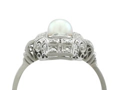 1940s 1.12 Carat Diamond and Pearl Platinum Art Deco Ring