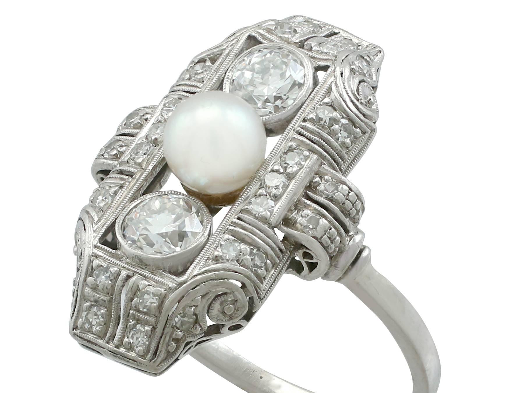 Women's or Men's 1940s 1.12 Carat Diamond and Pearl Platinum Art Deco Ring