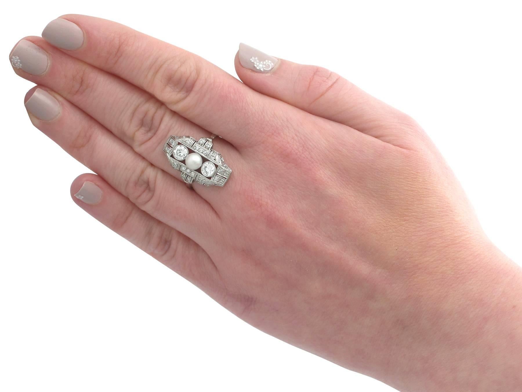 1940s 1.12 Carat Diamond and Pearl Platinum Art Deco Ring 3