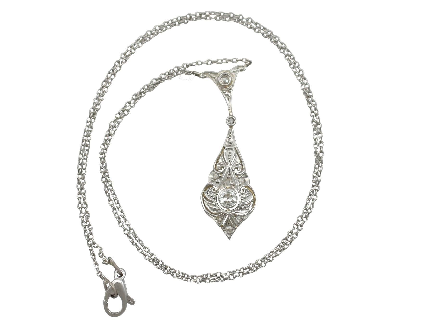 An impressive antique Art Deco 0.28 carat diamond and 18 karat yellow gold, 18 karat white gold set necklace; part of our diverse antique jewelry collections

This fine and impressive Art Deco necklace has been crafted in 18 k yellow gold with an 18