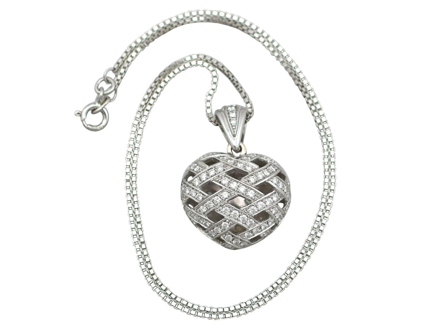 An impressive vintage 1.35 carat diamond and 18 karat white gold heart shaped pendant; part of our diverse antique jewelry and estate jewelry collections

This fine and impressive diamond heart pendant has been crafted in 18k white gold.

The