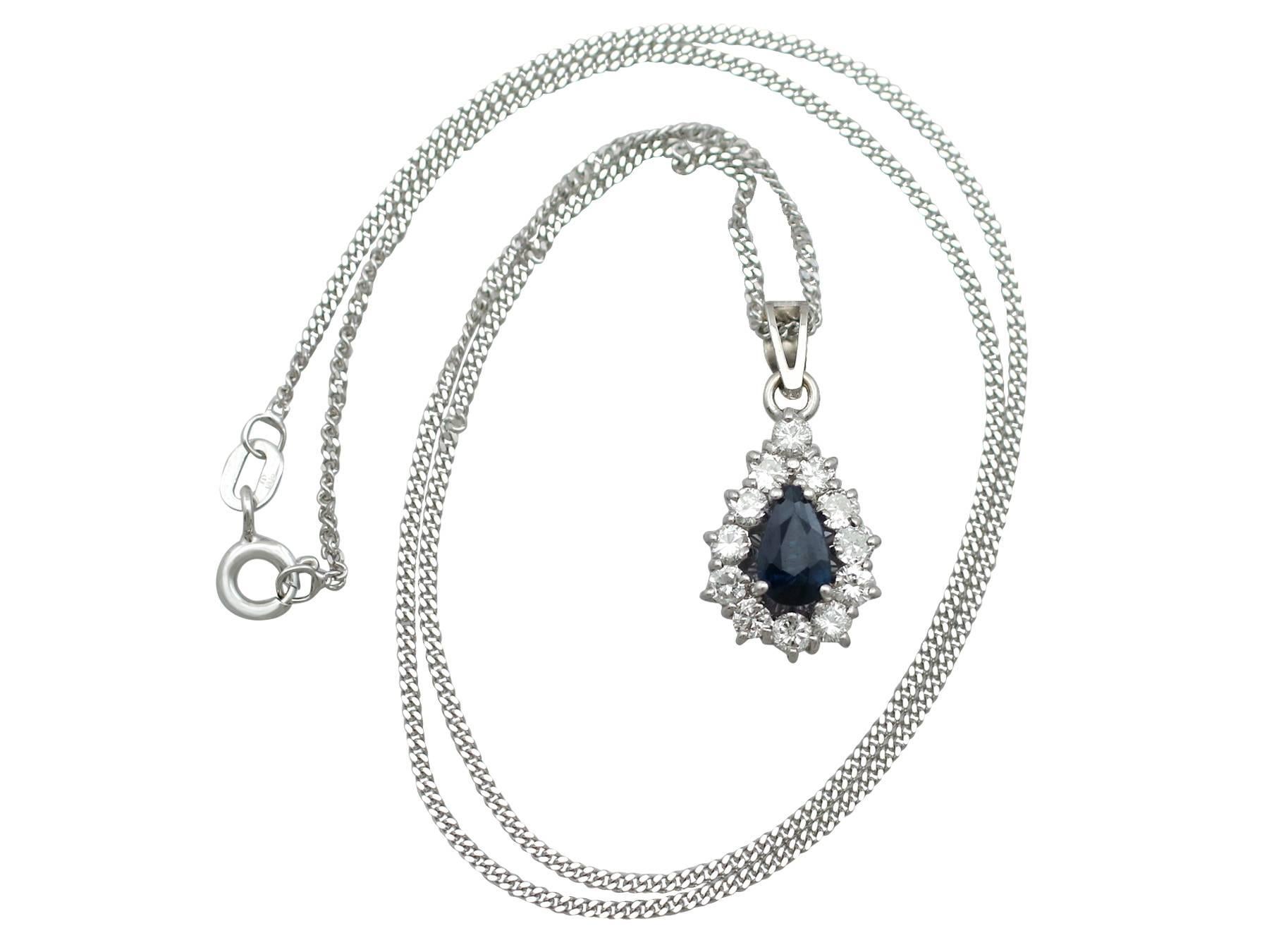 An impressive vintage 0.79 carat blue sapphire and 0.76 carat diamond, 14 carat white gold cluster pendant; part of our diverse gemstone jewelry and collections

This fine and impressive sapphire cluster pendant has been crafted in 14 ct white
