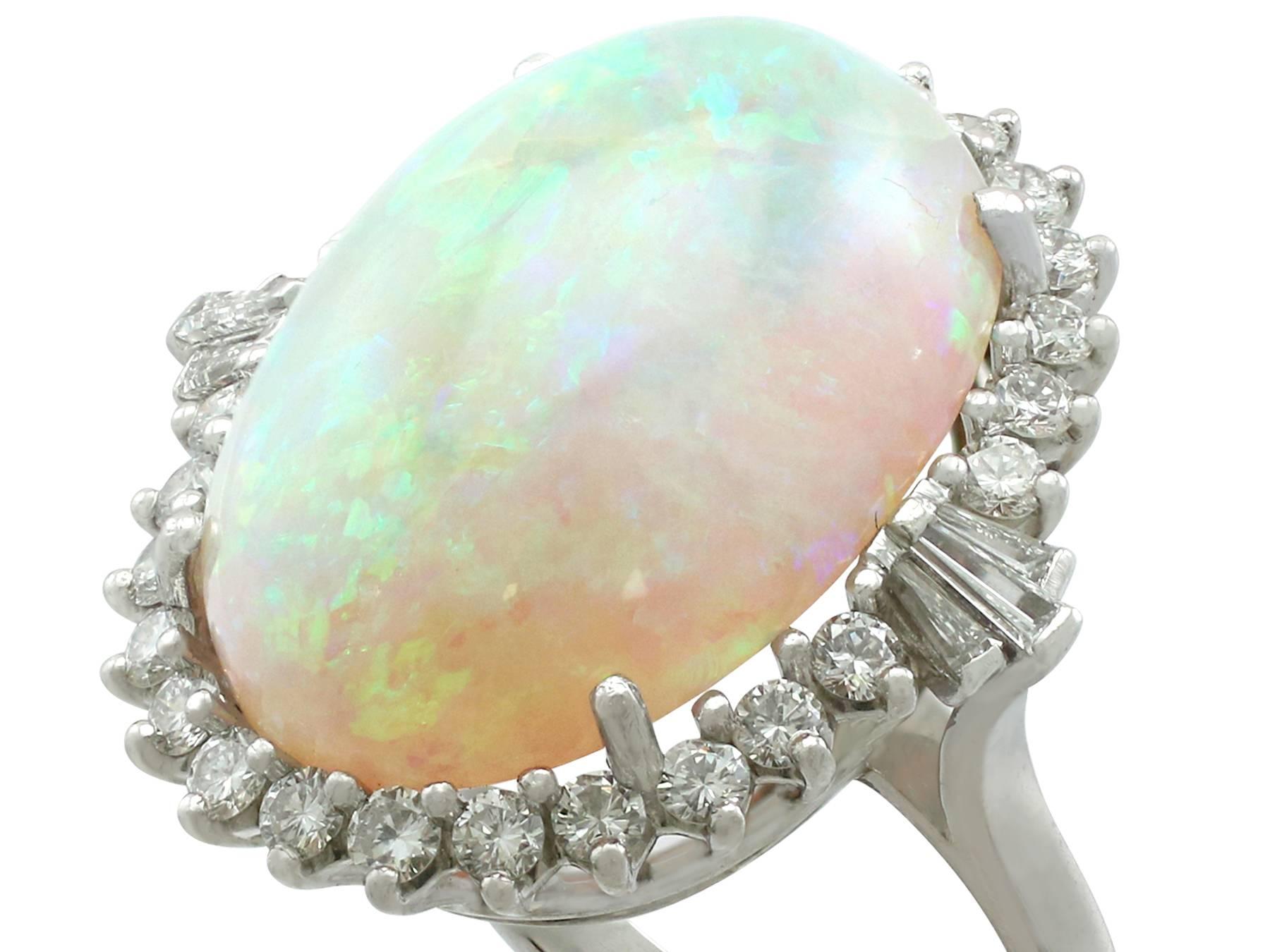 Oval Cut 1960s 14.65 Carat Opal and 1.10 Carat Diamond White Gold Cocktail Ring
