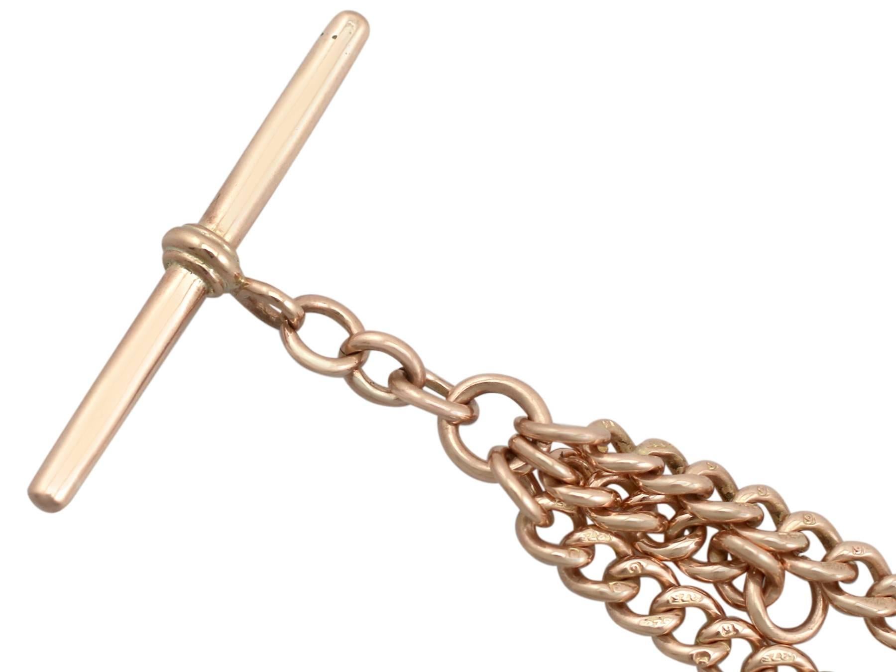 A fine and impressive antique 9 karat rose gold double Albert watch chain; part of our antique jewelry and estate jewelry collections.

This fine and impressive double Albert watch chain has been crafted in 9k rose gold.

The graduated rounded curb