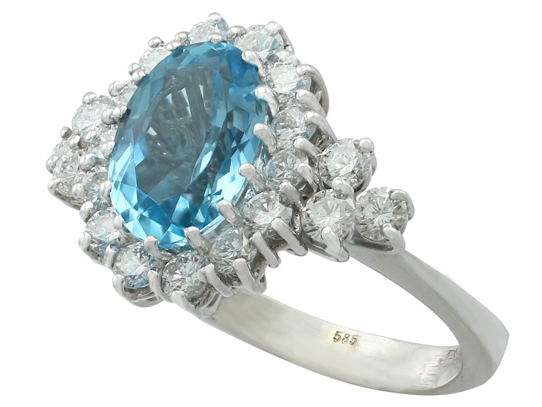 Oval Cut 1990s 3.59 Carat Aquamarine and Diamond White Gold Cluster Ring
