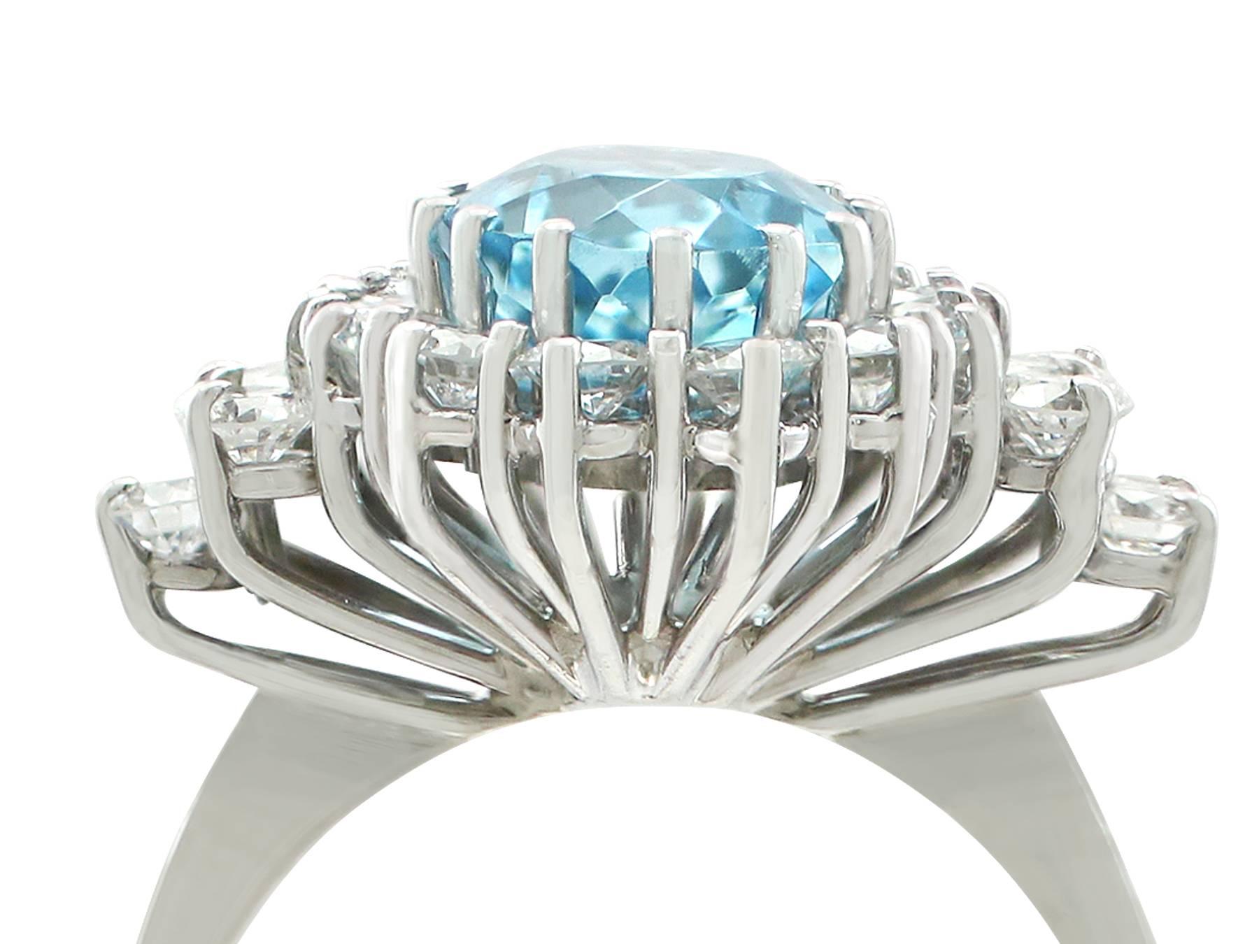 An impressive vintage 3.59 carat aquamarine and 1.00 carat diamond, 14 karat white gold cluster ring; part of our diverse gemstone jewelry and estate jewelry collections

This fine and impressive aquamarine and diamond ring has been crafted in 14k