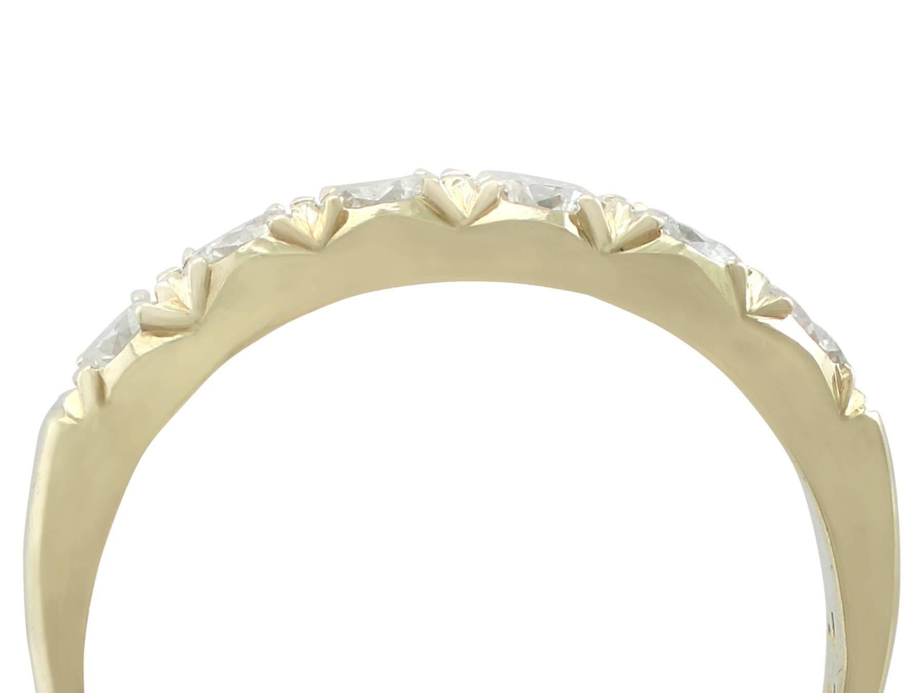 An impressive vintage 0.96 carat diamond and 18 karat yellow gold half eternity ring; part of our diverse antique jewelry and estate jewelry collections

This fine and impressive six stone diamond ring has been crafted in 18k yellow gold.

The