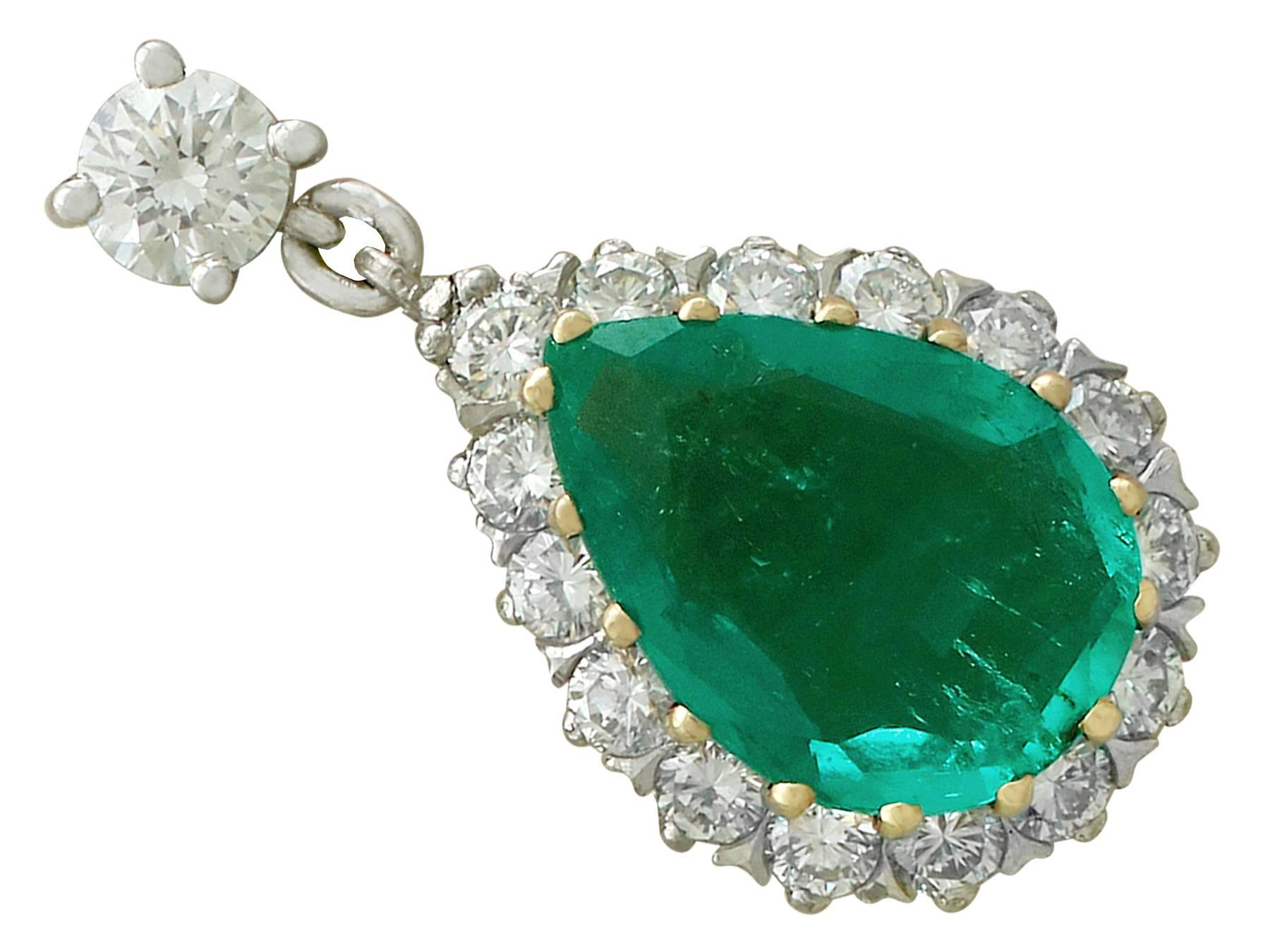 A stunning pair of vintage 4.18 carat emerald and 1.45 carat diamond, 18 karat yellow and white gold drop earrings; part of our diverse vintage jewelry collections

These stunning, fine and impressive emerald drop earrings have been crafted in 18k