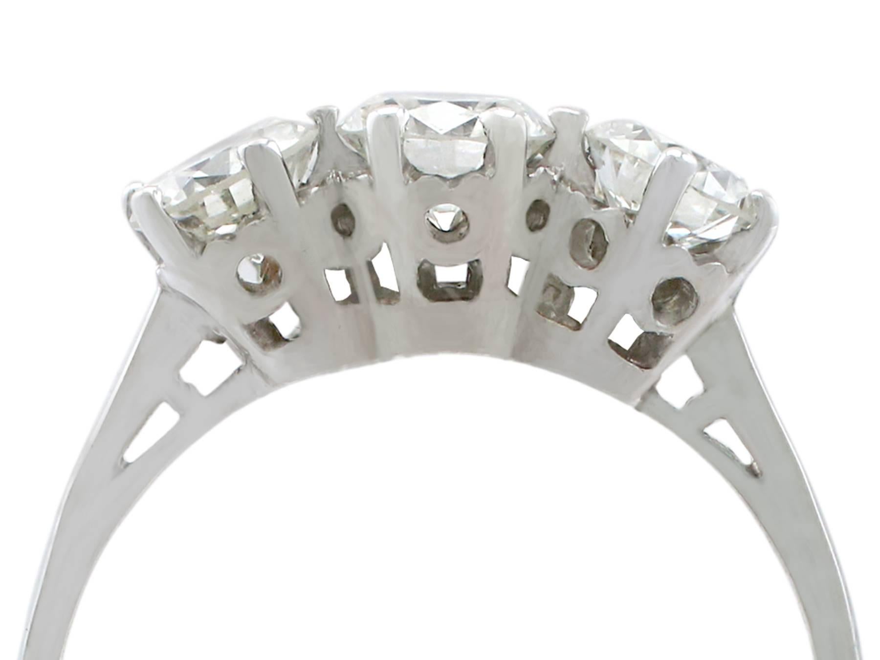 An impressive vintage 1970's 1.08 carat diamond and 18 karat white gold trilogy style dress ring; part of our diverse vintage jewelry and estate jewelry collections

This fine and impressive claw set trilogy ring has been crafted in 18k white