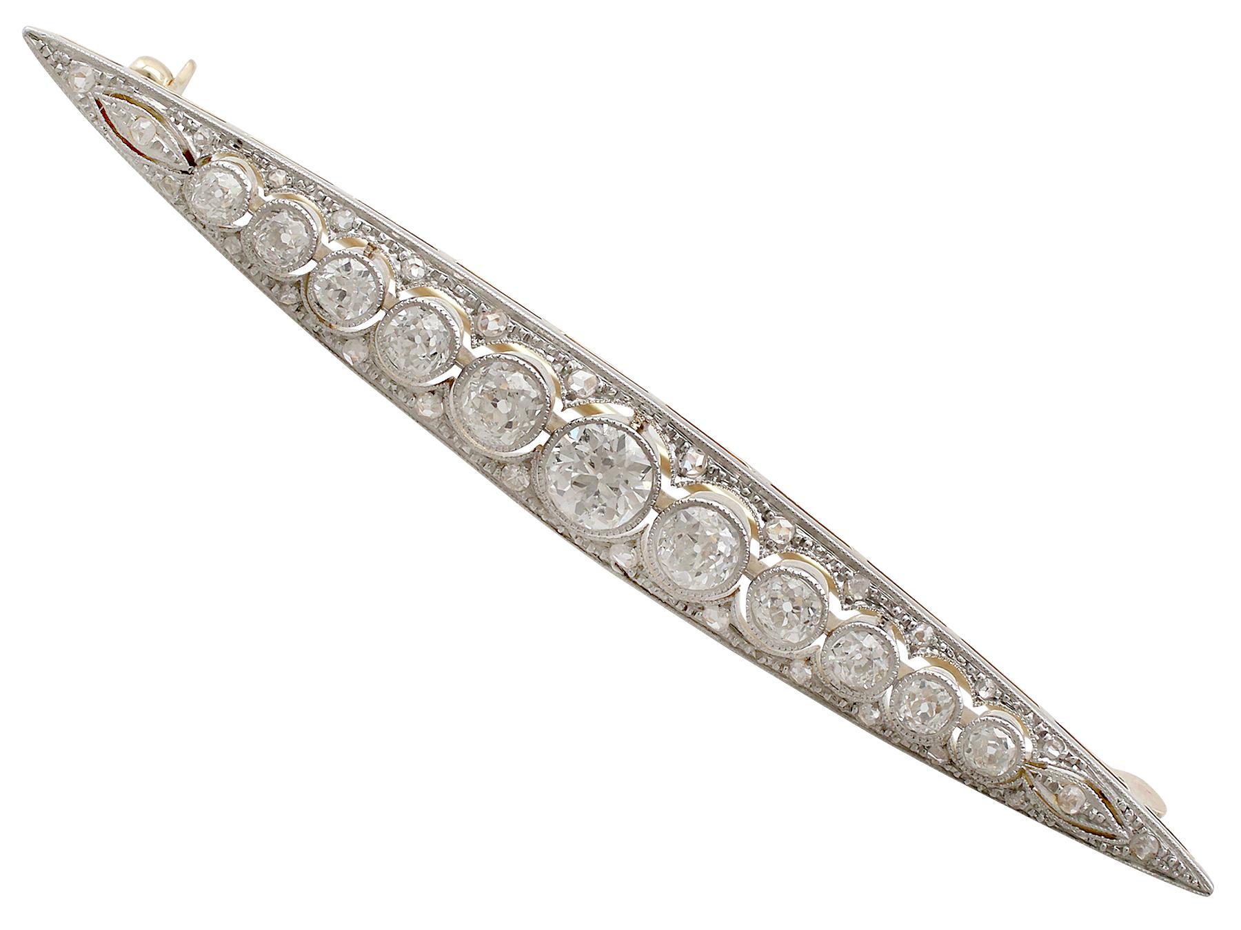 A stunning antique 2.02 Carat diamond and 14 karat yellow gold, platinum bar brooch; part of our diverse antique jewellery and estate jewelry collections.

This stunning, fine and impressive diamond bar brooch has been crafted in 14k gold with a
