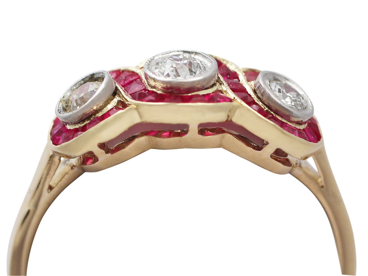 A fine and impressive antique French 0.33 carat natural ruby and 0.32 carat diamond, 18 karat yellow gold, platinum set dress ring; part of our antique jewelry and estate jewelry collections

This impressive antique diamond and ruby dress ring has