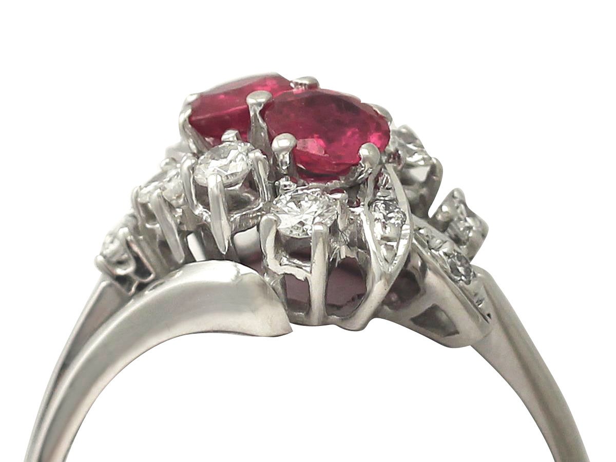 A fine and impressive vintage 0.70 carat natural ruby and 0.56 carat diamond, 18 karat white gold cocktail ring; part of our vintage jewelry and estate jewelry collections

This impressive vintage cocktail ring has been crafted in 18k white