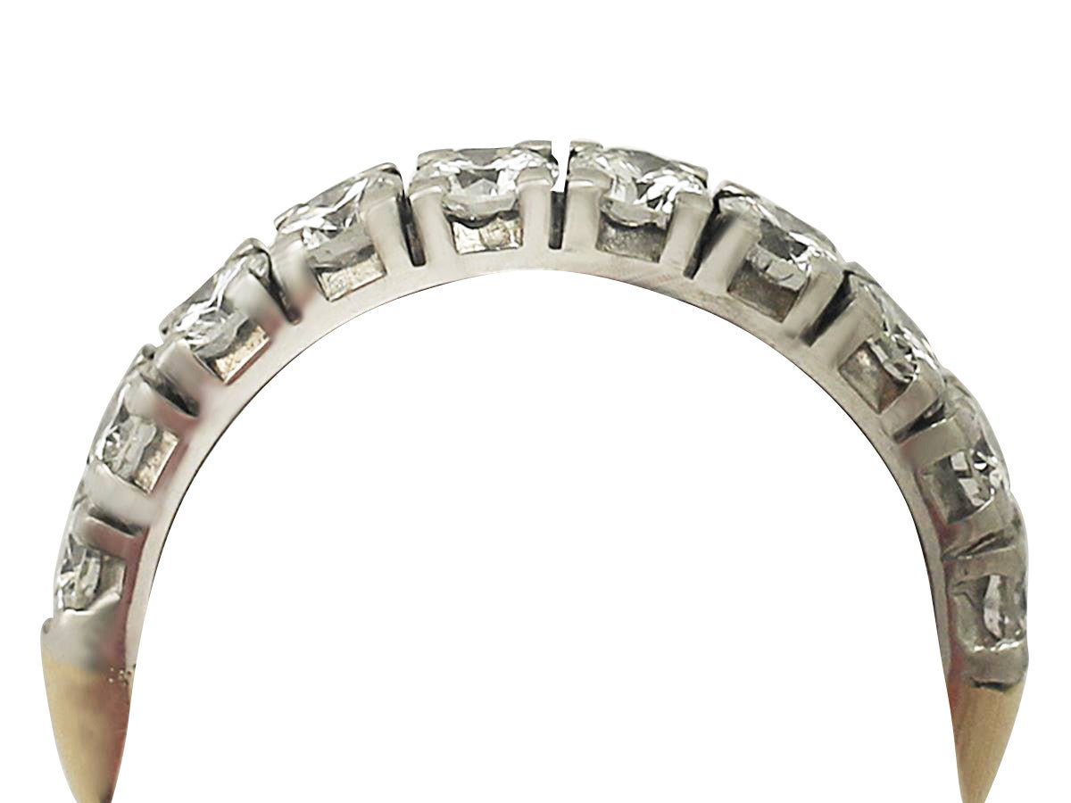 A fine and impressive contemporary 1.02 carat diamond, 18 karat yellow gold, platinum set half eternity ring; part of our diamond jewelry collections

This impressive half eternity ring has been crafted in 18 karat yellow gold with a platinum