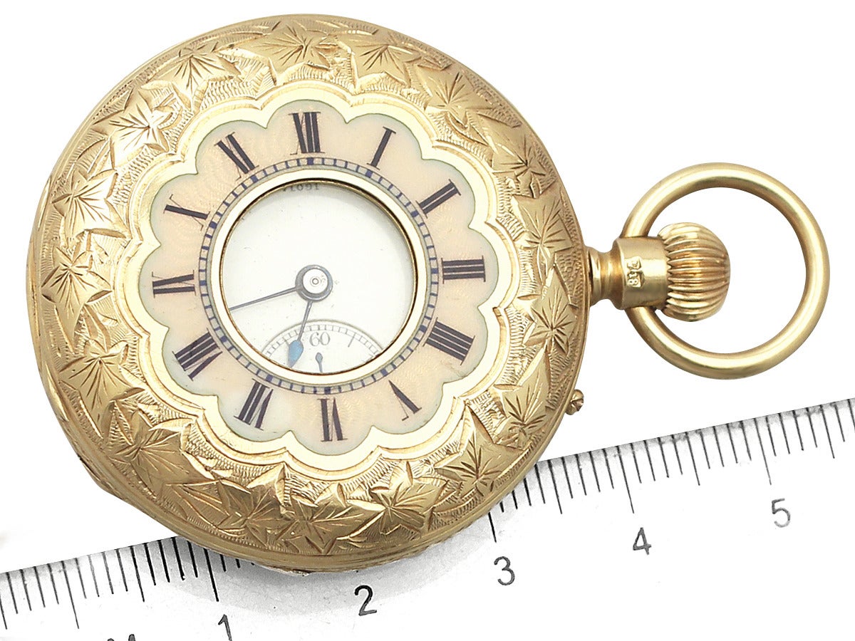 An exceptional fine and impressive antique Victorian solid gold half hunter style ladies' pocket watch; part of our diverse watch and jewelry collections.

This fine savonnette* style ladies' pocket watch has been crafted in 18k yellow
