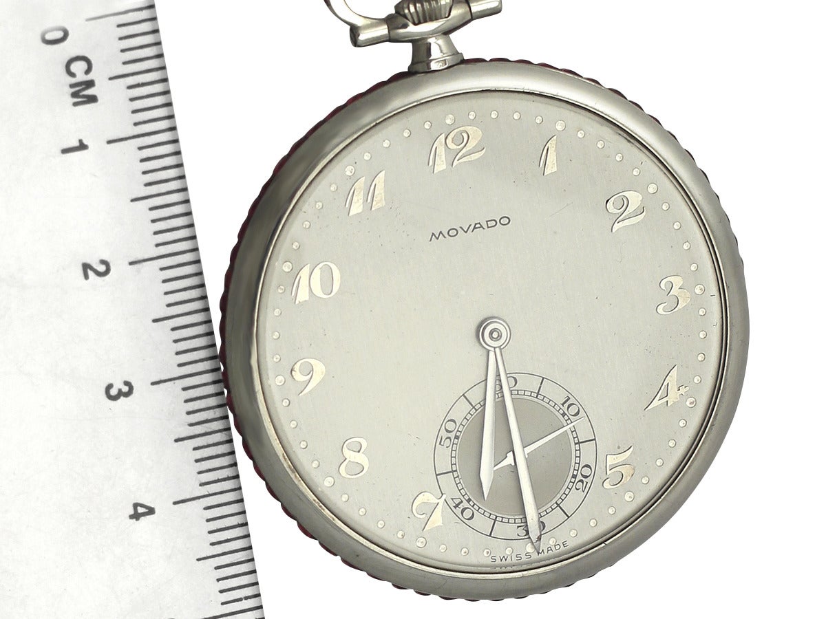 A fine antique 18 karat white gold Movado pocket watch embellished with 3.95 carat rubies; part of our diverse watch and clock collections

This exceptional example of an authentic Movado pocket watch has been crafted in 18k white gold.

The