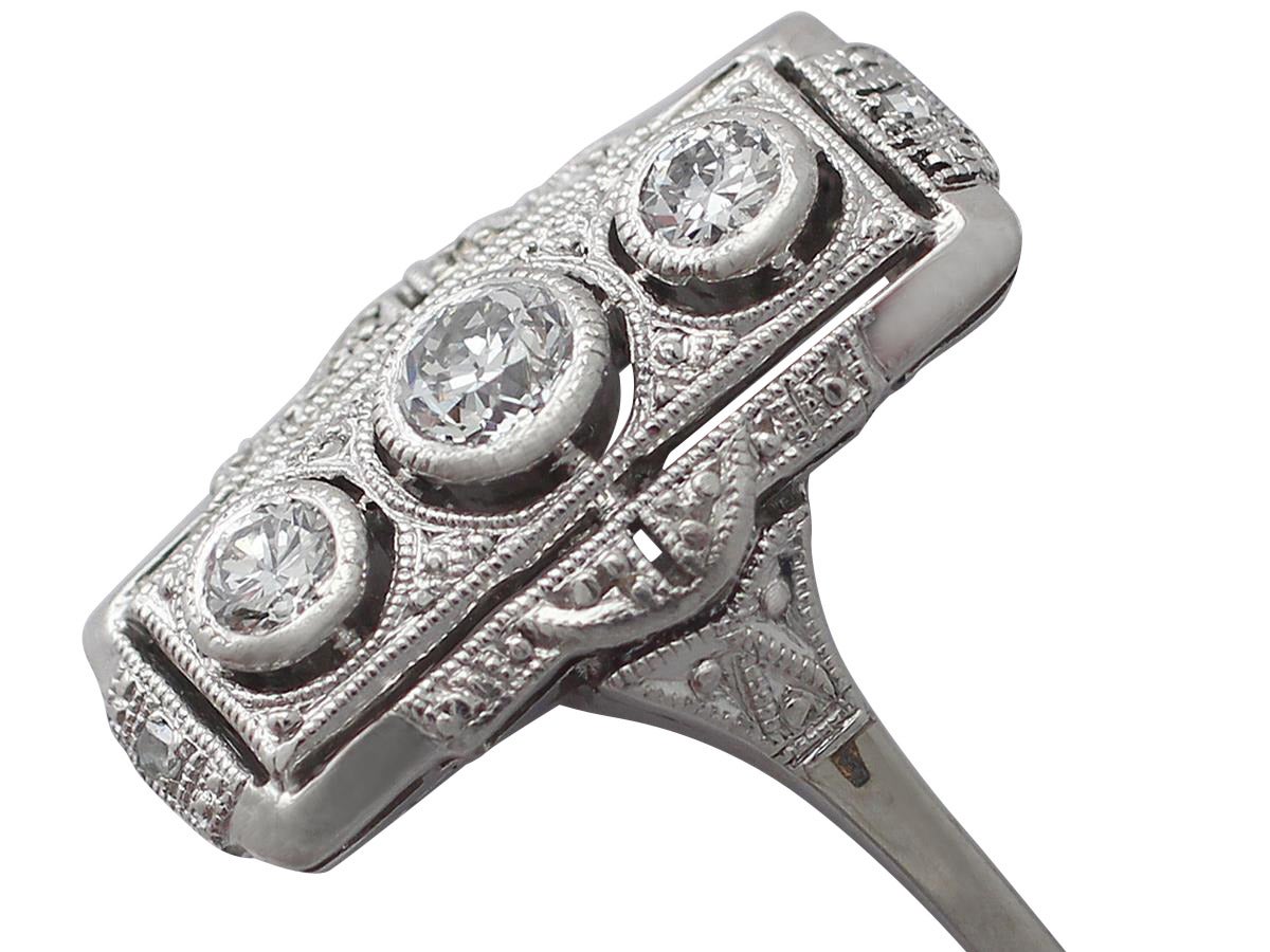 A fine and impressive 0.42 carat diamond and 14 karat white gold Art Deco style ring; part of our diverse range of antique jewelry/jewelry

This impressive Art Deco dress ring has been crafted in 14k white gold.

The ring has a elongated,