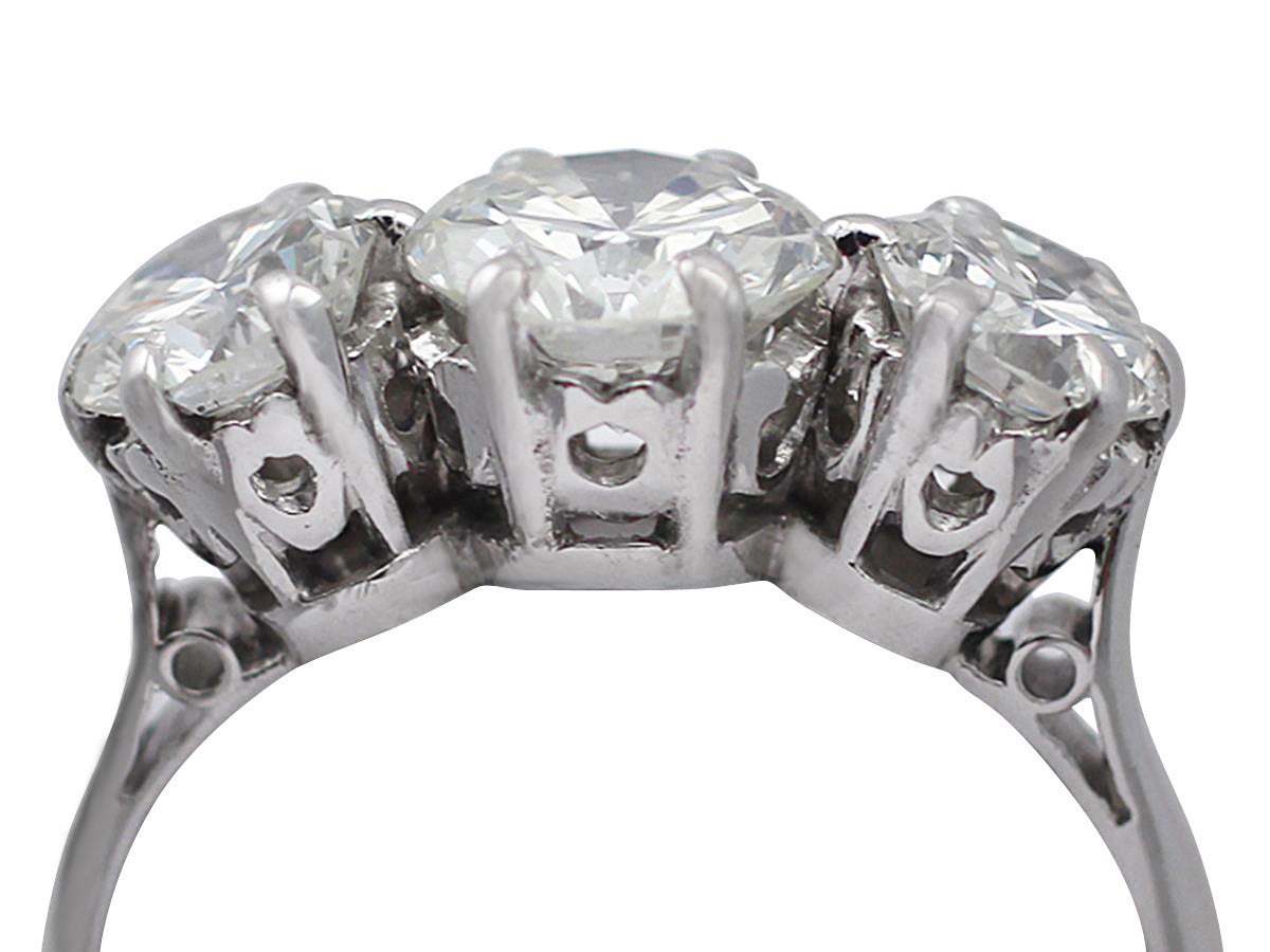 A stunning, fine and impressive vintage 1.74 carat diamond and platinum trilogy ring; part of our diverse diamond jewelry and estate jewelry collections

This stunning diamond trilogy ring has been crafted in platinum.

The vintage ring displays