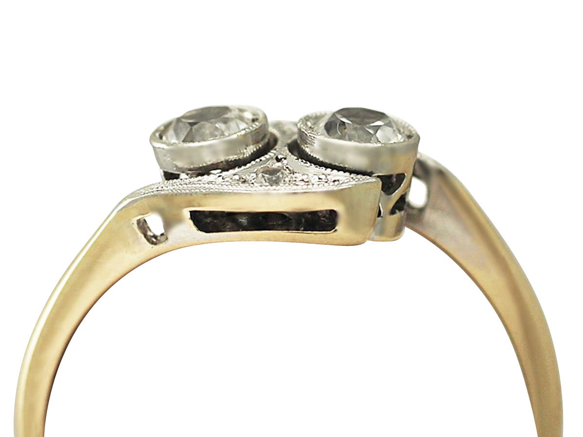 A fine and impressive 0.51 carat diamond and 18k yellow gold, platinum set twist ring; part of our antique diamond ring collection

This impressive 1920s ring has been crafted in 18k yellow gold with a platinum setting.

This dress ring displays two