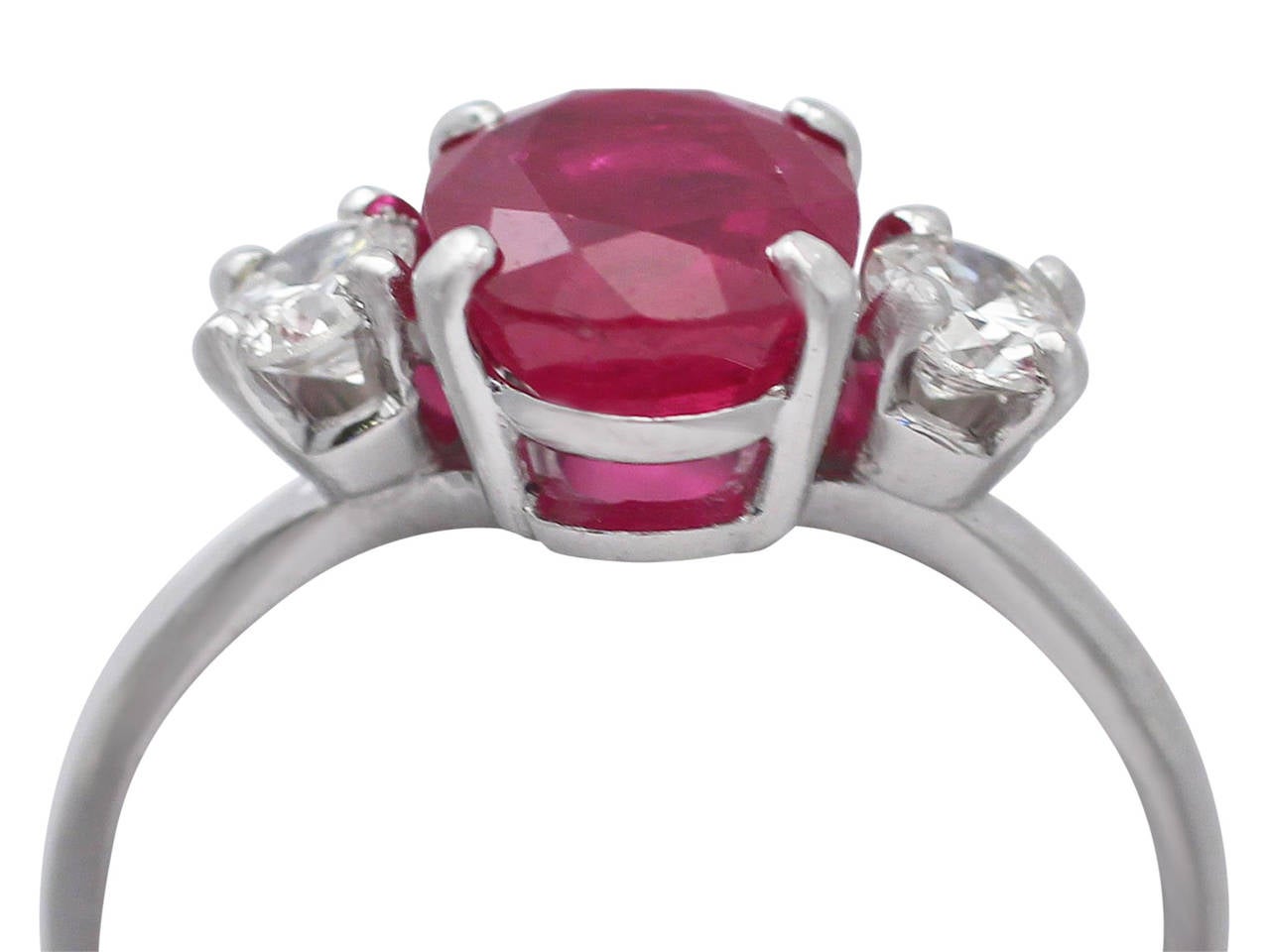 A fine and impressive vintage 2.02 carat natural ruby and 0.40 carat diamond, 18 karat white gold three stone/trilogy ring; an addition to our vintage jewelry and estate jewelry collections

This fine and impressive ruby and diamond trilogy ring