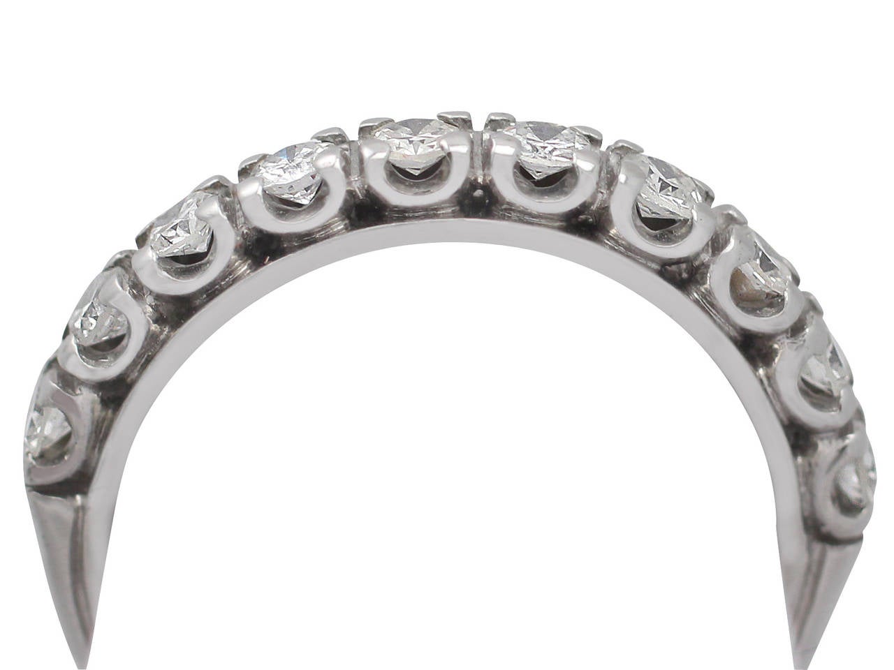 A very good vintage French 0.35 carat diamond and 18 karat white gold half eternity ring; part of the vintage jewelry/diamond jewelry collections

This vintage half eternity/multi-diamond ring has been crafted in 18k white gold.

The ring is claw /