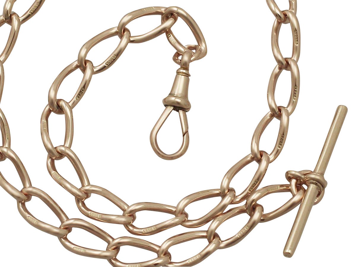 A fine and impressive antique 9 karat rose gold Albert watch chain; part of our antique jewelry/estate jewelry collections

This impressive antique Albert watch chain has been crafted in 9k rose gold.

The oval curb links that make up this