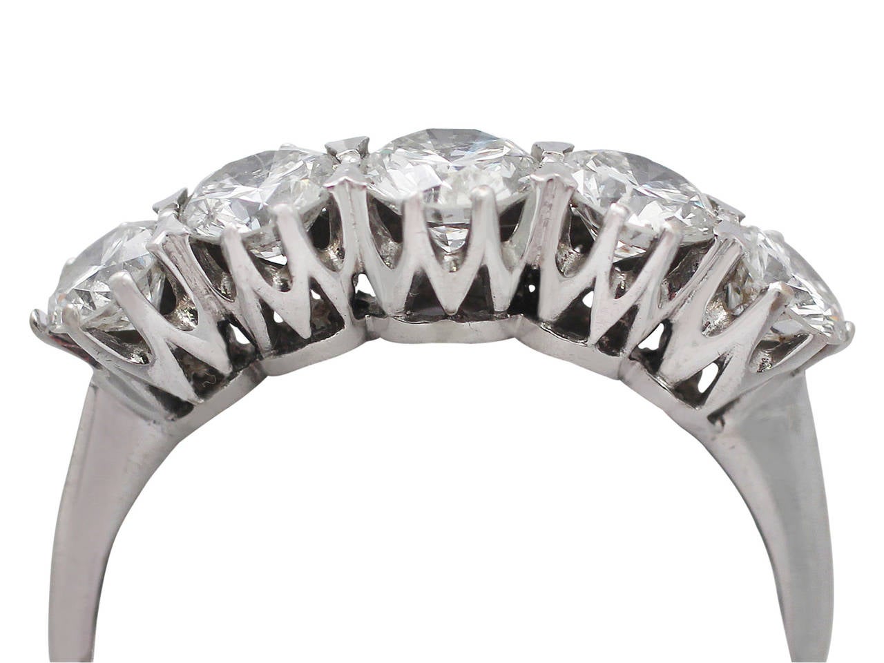 A fine and impressive English 1.72 carat diamond and 18 karat white gold five stone ring; part of the contemporary jewelry collection at 

This fine contemporary diamond ring has been crafted in 18k white gold.

The elevated pierced decorated