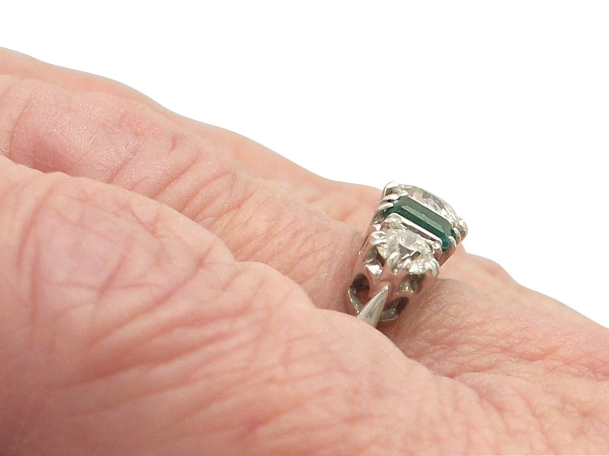 1.18 Carat Diamond and 0.72 Carat Emerald, 18k White Gold Five Stone Ring 4