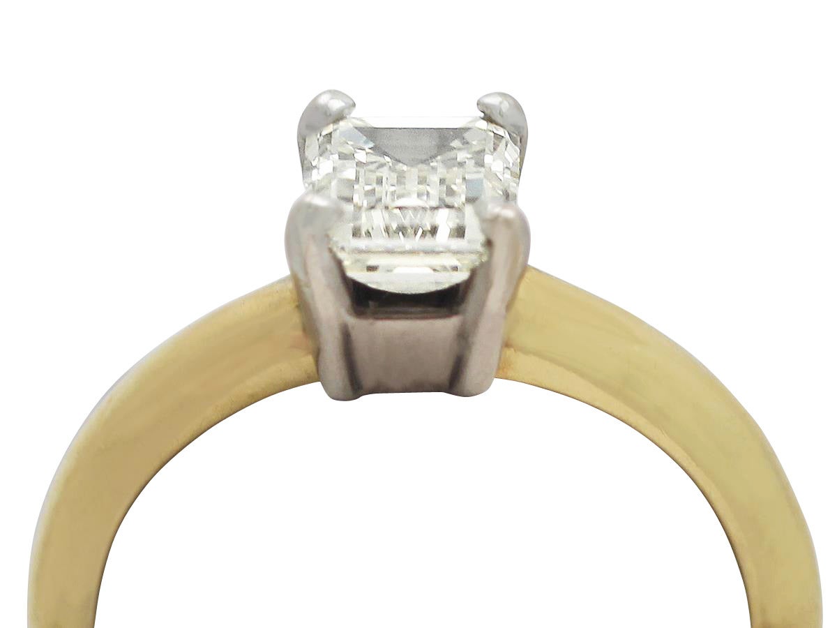 A very good 1.10 carat emerald cut diamond, 18 karat yellow gold solitaire ring; part of our diamond jewellery collection

This contemporary diamond ring has been crafted in 18k yellow gold, with an 18 karat white gold setting.

The 1.10ct