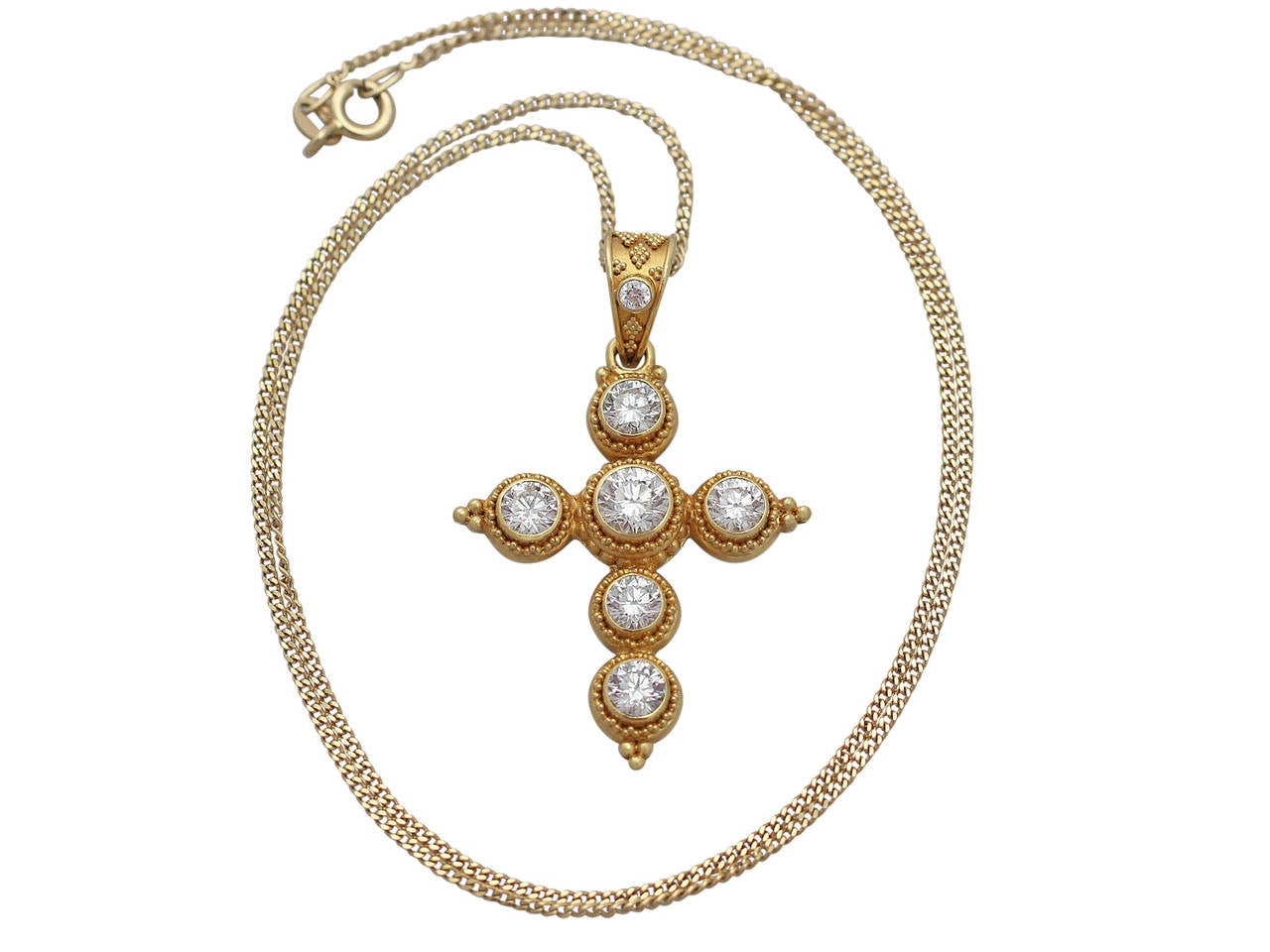 A very fine and impressive vintage 2.54 carat diamond and 22 karat yellow gold cross pendant; part of our diverse vintage jewelry range

This fine and impressive vintage cross pendant has been crafted in 22k yellow gold.

The pendant displays a