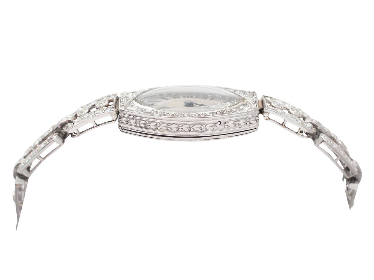 A fine and impressive 2.02 carat diamond and platinum antique Art Deco style cocktail watch; part of our diamond jewelry and estate jewelry collections

This fine and impressive antique ladies diamond cocktail watch has been crafted in